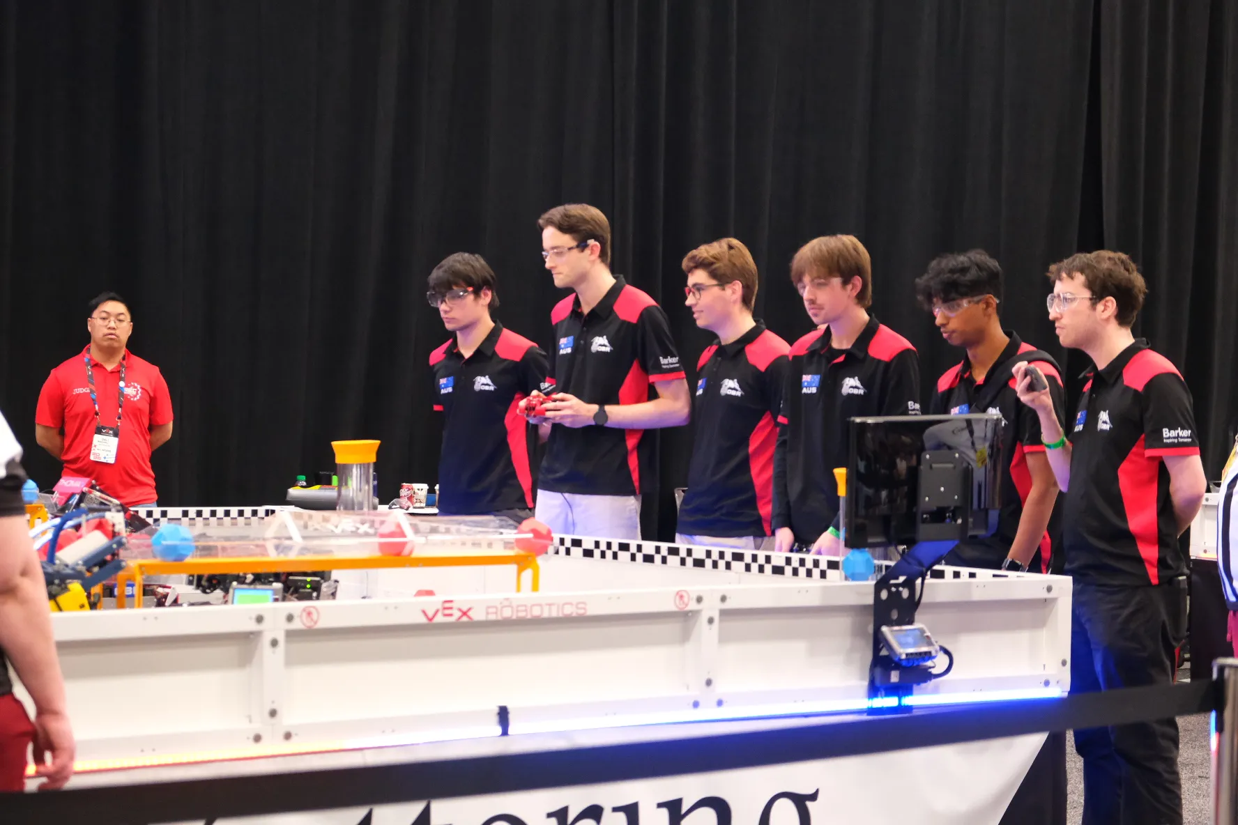 Old Barker Redbacks team at a VEX U competition field